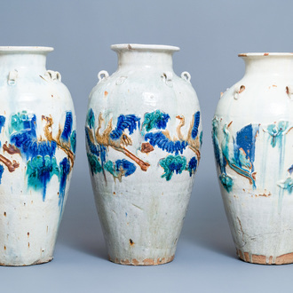 Three large Chinese polychrome relief-molded martaban jars, Qing