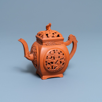 A Chinese reticulated Yixing stoneware teapot and cover, Kangxi