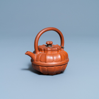 A Chinese Yixing stoneware chrysanthemum-shaped teapot and cover, Yongzheng/Qianlong