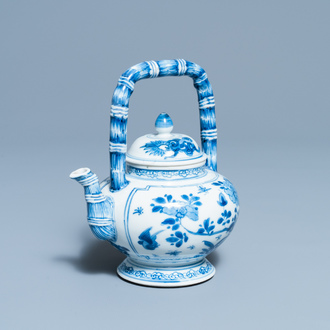 A Chinese blue and white teapot with bamboo-shaped spout and handle, Kangxi