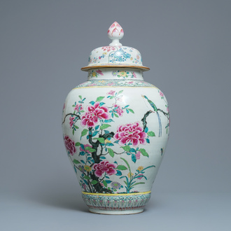 A large Chinese famille rose vase and cover with a bird on blossoming branches, Yongzheng