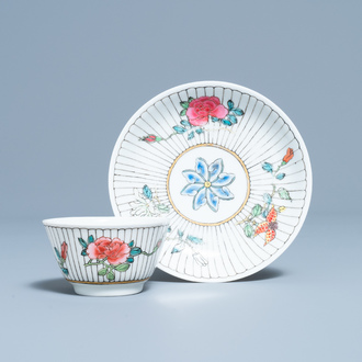 A Chinese famille rose cup and saucer with floral design, Yongzheng