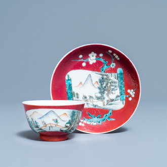 A Chinese famille rose ruby-ground cup and saucer, Yongzheng