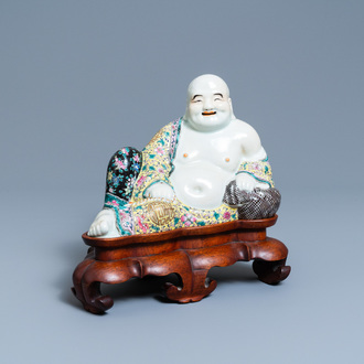 A Chinese famille rose figure of the reclining Buddha, seal mark, Republic