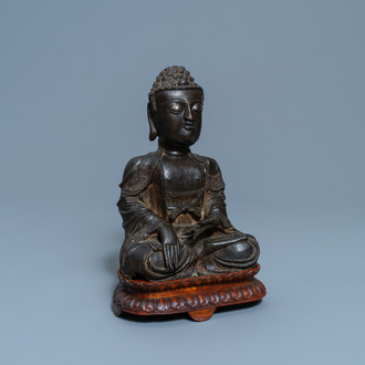 A Chinese bronze figure of Buddha, Ming