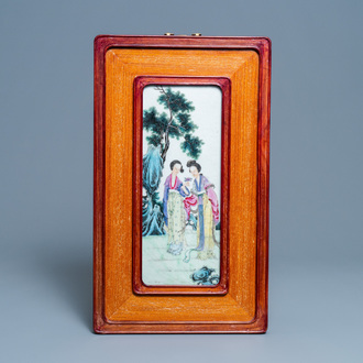 A Chinese famille rose plaque with two ladies in a garden, Republic