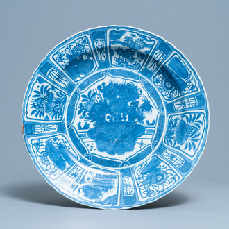 A very large Chinese blue and white kraak porcelain charger with a flower basket, Wanli