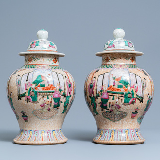 A pair of Chinese Nanking famille rose crackle-glazed 'court scene' vases, 19th C.