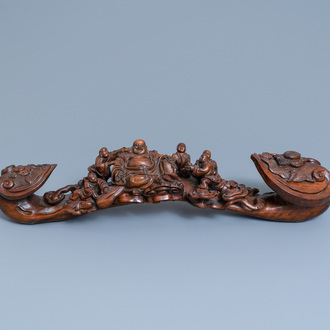 A large Chinese carved wooden ruyi scepter, 19th C.