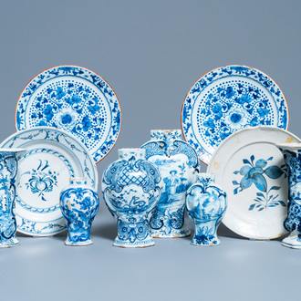 A varied collection of blue and white Dutch Delft plates and vases, 18th C.