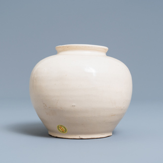 A Chinese monochrome white-glazed jar, Tang