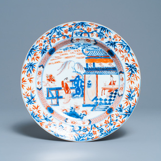 Un plat en porcelaine de Chine de style Imari à décor de scènes du 'Xi Xiang Ji', Kangxi