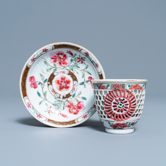 A Chinese reticulated double-walled famille rose cup and saucer, Yongzheng