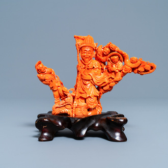 A Chinese carved red coral 'immortal' group, 19/20th C.