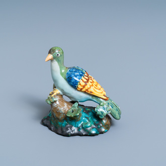 A polychrome Brussels faience model of a seated pigeon, 18th C.