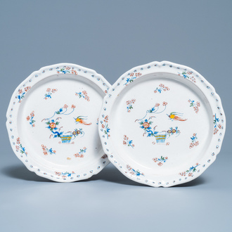 A pair of deep Brussels faience plates with 'à la haie fleurie' design, 18th C.