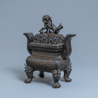 A large Chinese bronze censer and cover, Ming