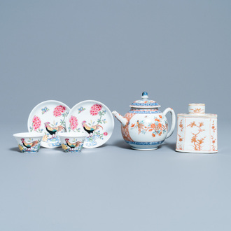 A pair of Chinese famille rose cups and saucers, a Dutch-decorated teapot and a tea caddy, Kangxi/Qianlong