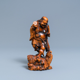 A Chinese carved boxwood figure of Liu Hai, Qing