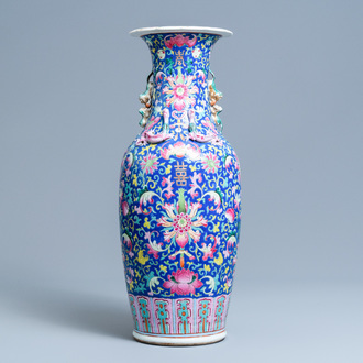 A Chinese famille rose blue-ground vase, 19th C.