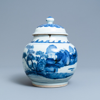 Un pot couvert en porcelaine de Chine en bleu et blanc à décor d'un paysage, époque Transition