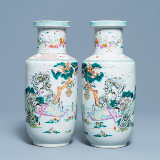 A pair of Chinese famille rose rouleau vases with immortals, 19/20th C.