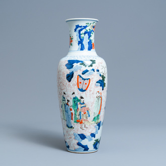 A Chinese wucai vase with continuous figurative design, 19th C.