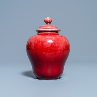 A Chinese monochrome copper red vase and cover, Qianlong/Jiaqing