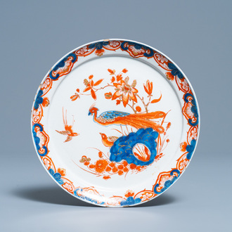 A Dutch Delft doré 'peacock' plate, 18th C.