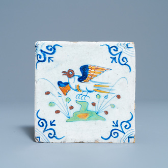 A polychrome Dutch Delft 'bird' tile, 17th C.