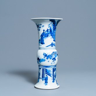 Een Chinese blauw-witte 'gu' vaas met figuratief decor, Kangxi