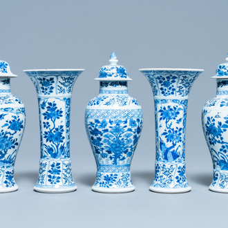 A Chinese blue and white garniture of five vases, Kangxi