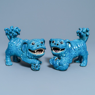 A pair of Chinese robin's egg-glazed models of Buddhist lions, 19th C.