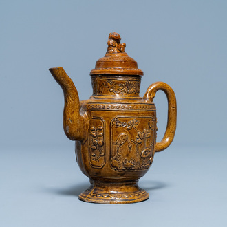 A Chinese brown-glazed relief-decorated teapot and cover, 18/19th