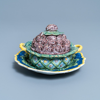 A polychrome Dutch Delft 'berry' tureen and cover on stand, 18th C.
