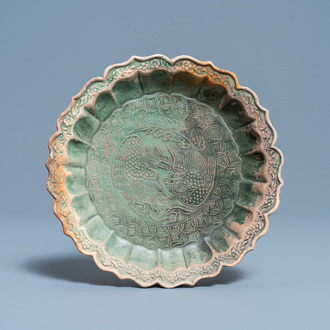 A Chinese green-glazed lotus-shaped 'phoenix' dish, Yuan