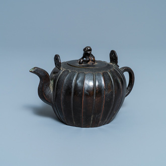 A Chinese lacquered bronze teapot and cover, Yuan