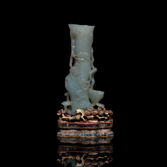 A Chinese jade vase on reticulated stand, Qing