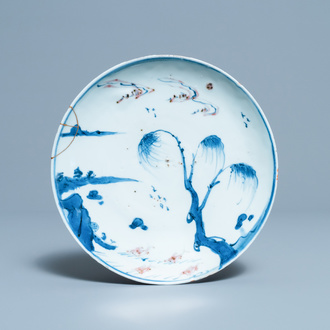 A Chinese blue, white and copper red ko-sometsuke 'fish' plate for the Japanese market, Transitional period