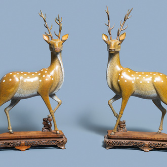 An exceptional and large pair of Chinese cloisonné models of deer, Qianlong/Jiaqing