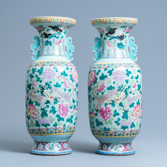 A pair of Chinese famille rose celadon-ground 'dragon' vases, 19th C.