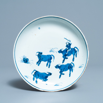 A Chinese blue and white ko-sometsuke 'oxen' plate for the Japanese market, Tianqi