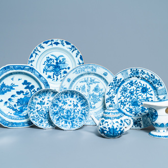 Six Chinese blue and white dishes, a teapot and a helmet-shaped jug, Kangxi and later