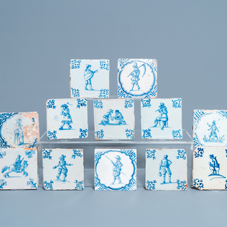 Twelve Dutch Delft blue and white tiles with figures, 17th C.