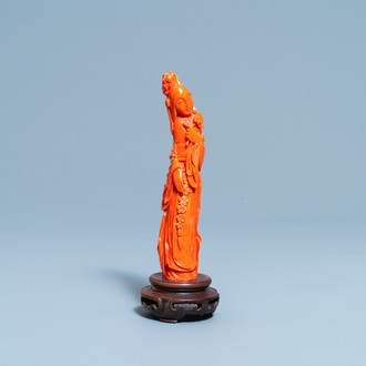 A Chinese carved red coral figure of a lady, 19/20th C.