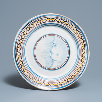 A large polychrome Spanish faience 'portrait' dish, 19th C.