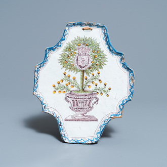 A polychrome Dutch Delft 'Orange tree' plaque, 18th C.