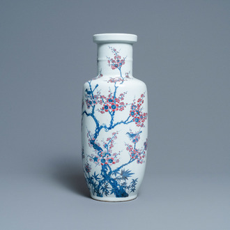 A Chinese blue, white and copper-red rouleau vase with birds among blossoming branches, 20th C.