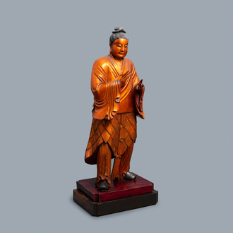 A massive Chinese gilded wooden figure of a standing male, 18/19th C.