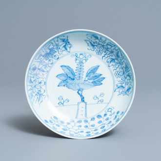 A Chinese blue and white 'pomegranate tree' plate, Yongzheng mark and of the period